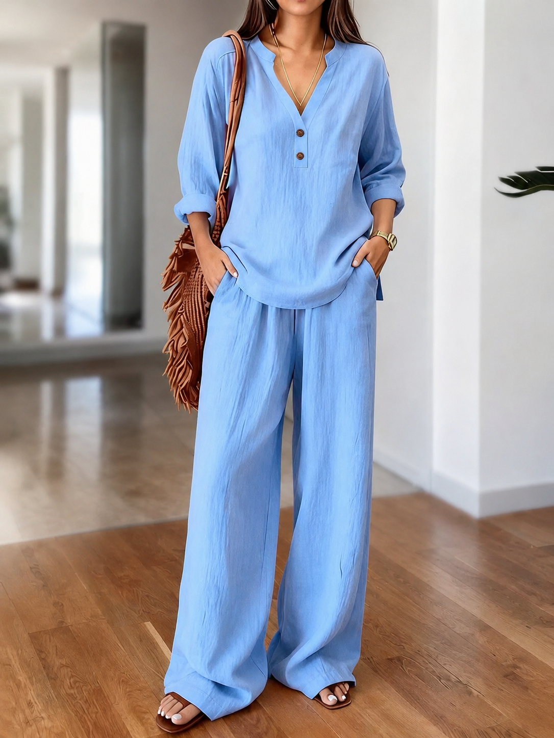 Light blue long-sleeve two-piece set with V-neck tunic top and wide-leg pants