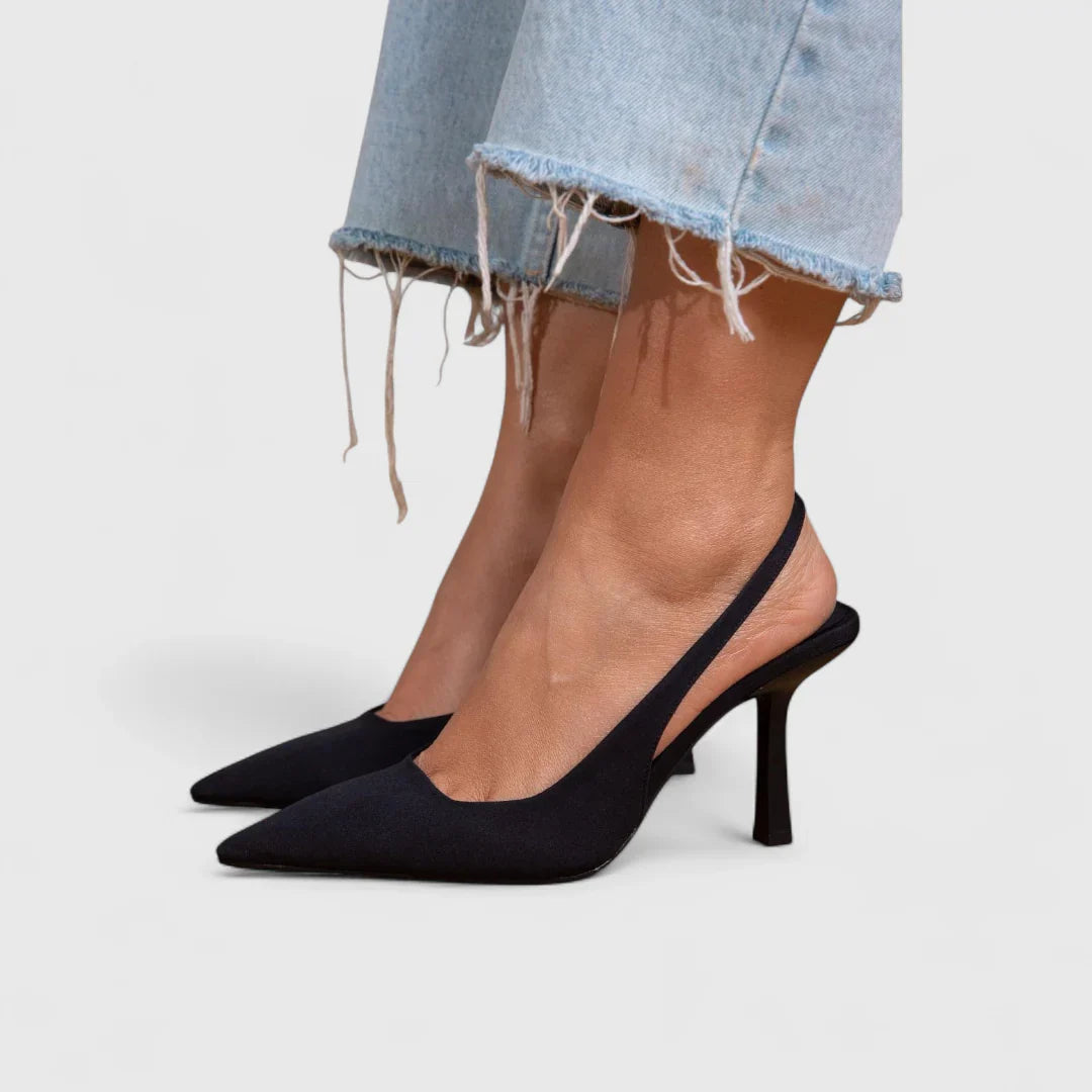 Black pointed-toe orthopedic pumps with mid-height block heel and slip-on styling
