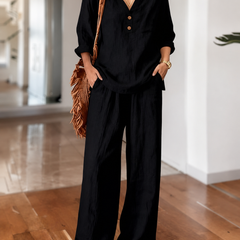 Black long-sleeve two-piece set with V-neck tunic top and wide-leg pants