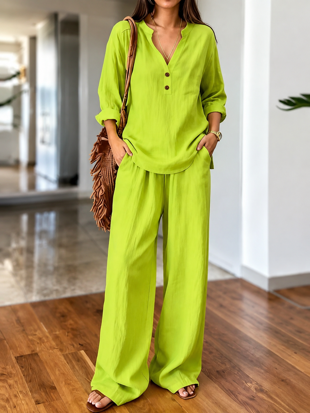 Lime green long-sleeve two-piece set with V-neck tunic top and wide-leg pants