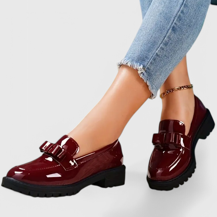 Red patent loafers on chunky block heel with buckle strap detail