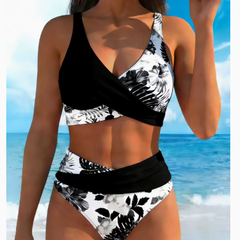 Black floral contrast wrap bikini set with white leaf print high-rise bottoms