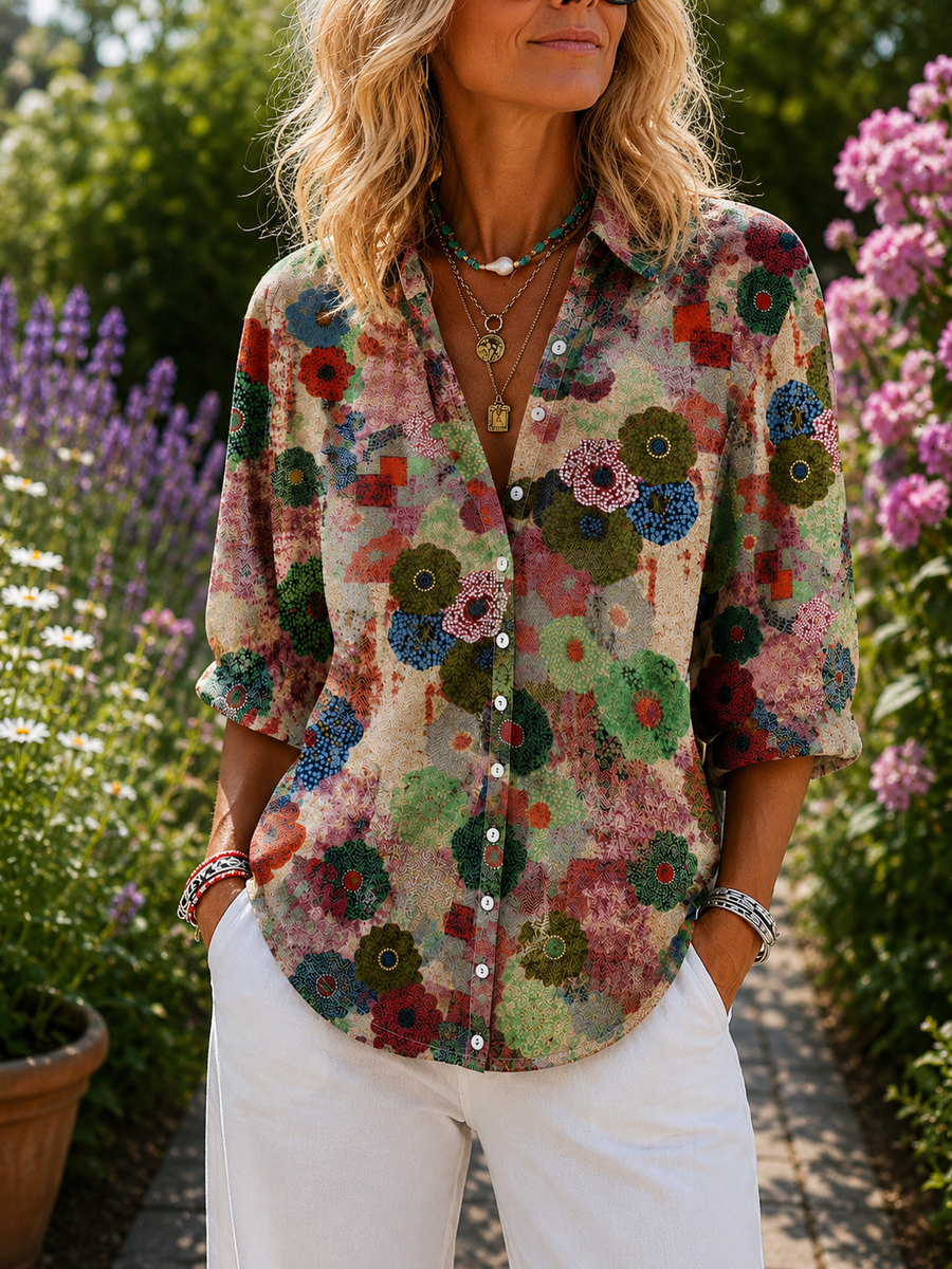 Multicolor floral button-front blouse with 3/4 sleeves and V-neck