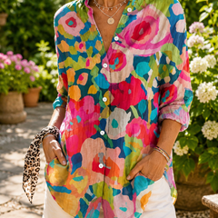 Colorful abstract button-up blouse with collar, 3/4 sleeves, and front buttons