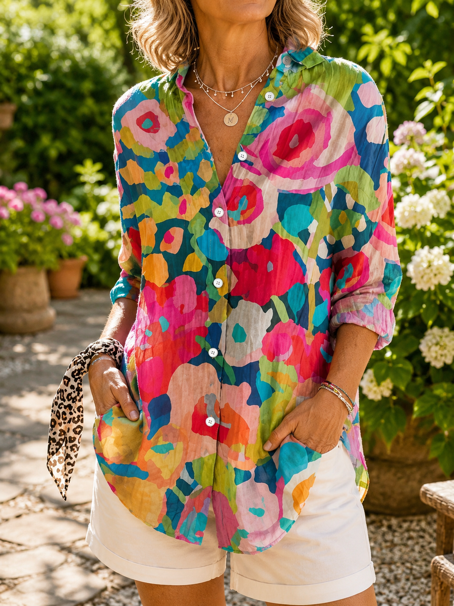 Colorful abstract button-up blouse with collar, 3/4 sleeves, and front buttons