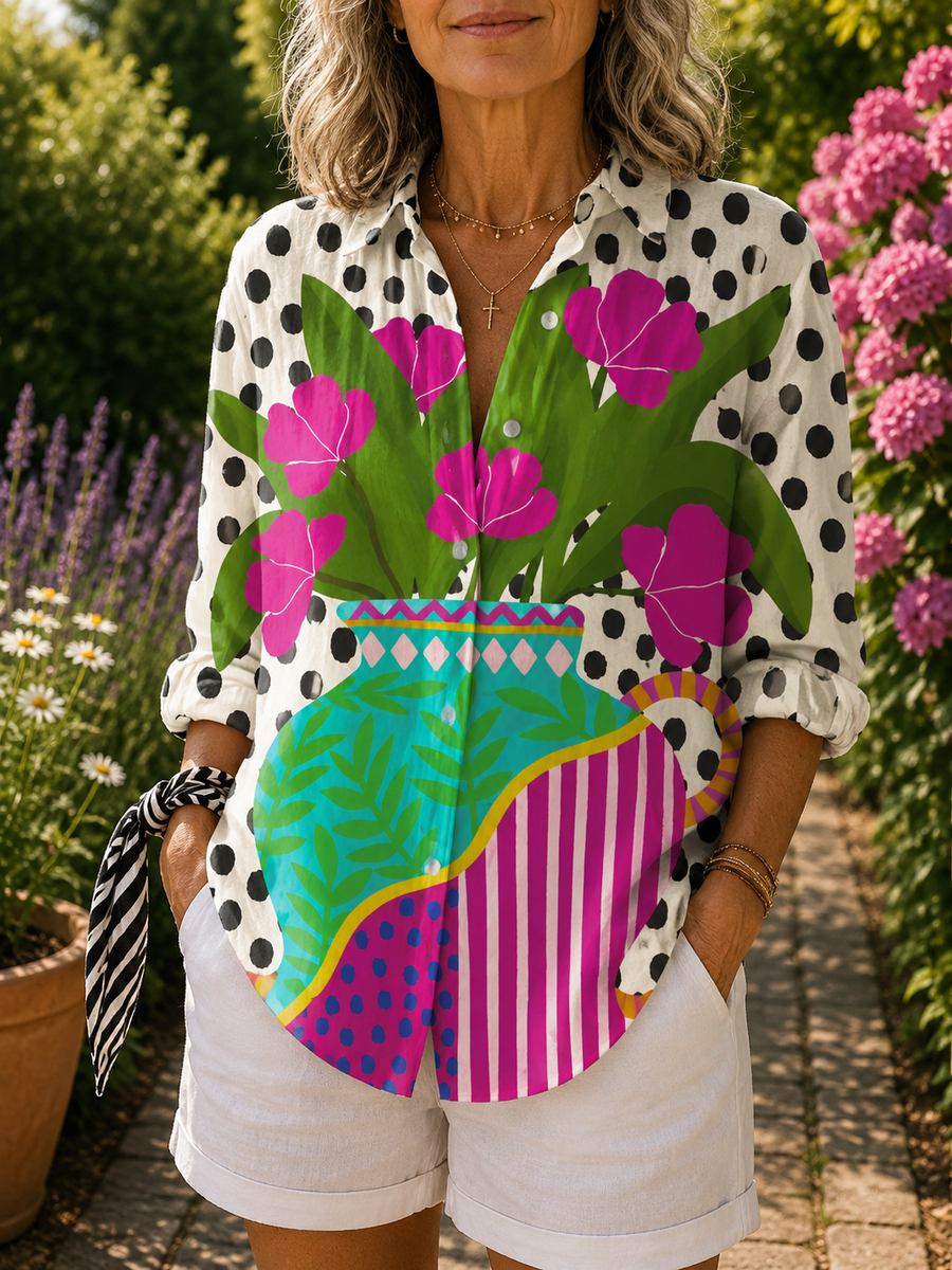 Blooming vase blouse with white polka-dot sleeves and colorful floral striped panel