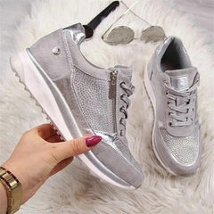 Silver grey zip-up comfort sneakers with lace-up front, side zipper, white sole