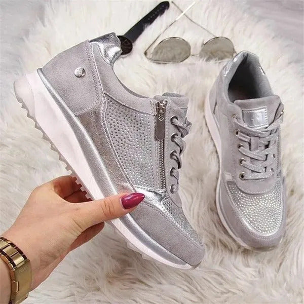 Silver grey zip-up comfort sneakers with lace-up front, side zipper, white sole