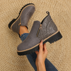Women's ankle boots in dark gray suede with croc-pattern side panels and zip.