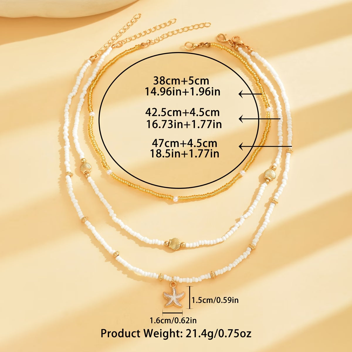 Layered necklace set with white bead chains and gold accents, starfish and shell charms