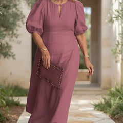 Wine pink maxi dress with puff sleeves and keyhole neckline, gathered waist.
