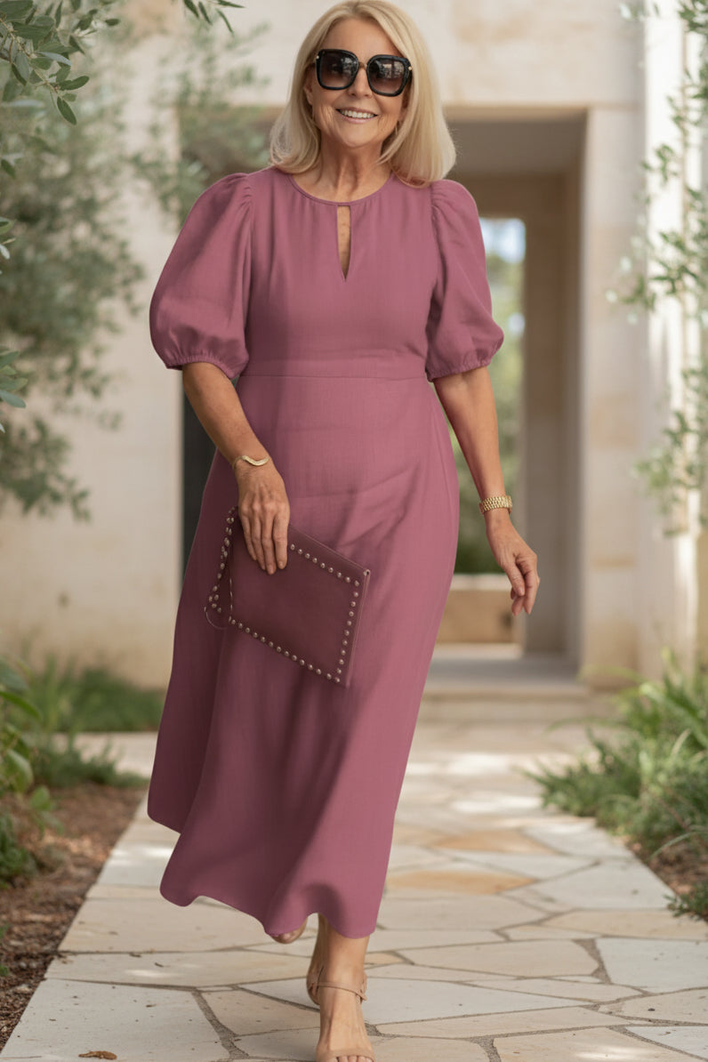 Wine pink maxi dress with puff sleeves and keyhole neckline, gathered waist.