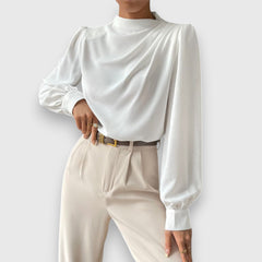 White long-sleeve satin top with high neckline and gathered sleeves