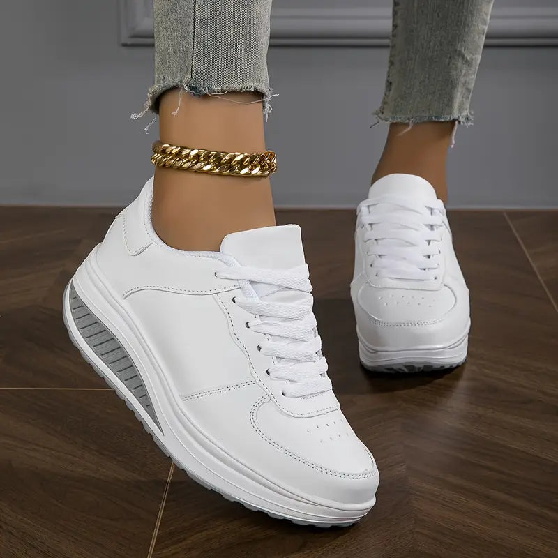 White platform comfort sneakers with lace-up front and cushioned midsole