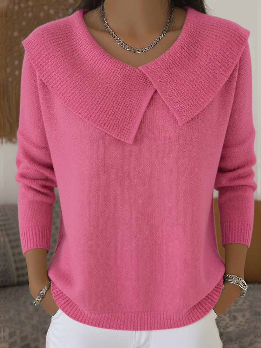 Warm pink knit jumper with soft folded collar and long sleeves