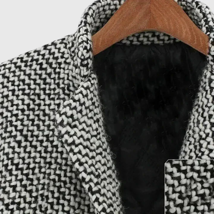 Tweed collar close-up with black lining, showing thick textured herringbone weave