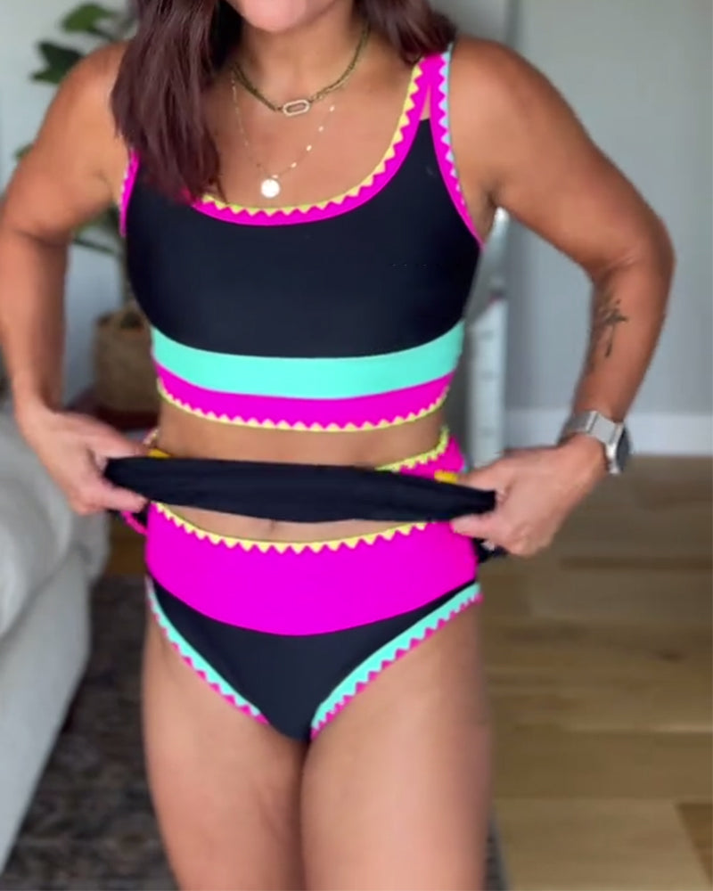 Three-piece swimsuit set in black with hot pink and turquoise stripes, cropped top and briefs