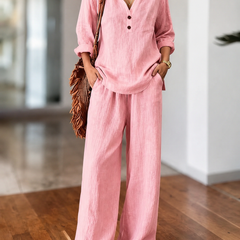Pink long-sleeve two-piece set with V-neck tunic top and loose wide-leg pants