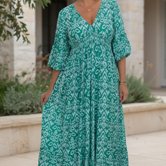 Teal blue bohemian dress with white pattern, V-neck, gathered waist, 3/4 sleeves