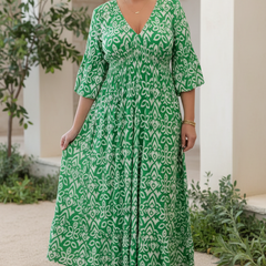 Mint green bohemian dress with white pattern, V-neck, gathered waist, 3/4 sleeves