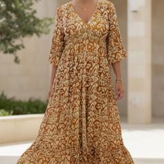 Warm orange bohemian dress with cream pattern, V-neck, gathered waist, 3/4 sleeves