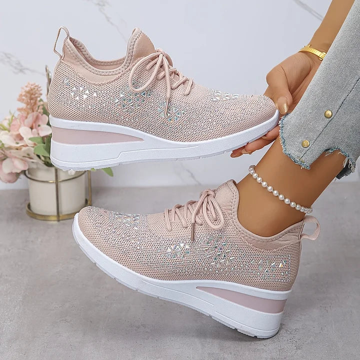 Blush pink comfort sneakers, lace-up knit upper with white sole and cushioned wedge