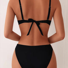 Black backless bikini set with strappy open back and bow tie at the waist