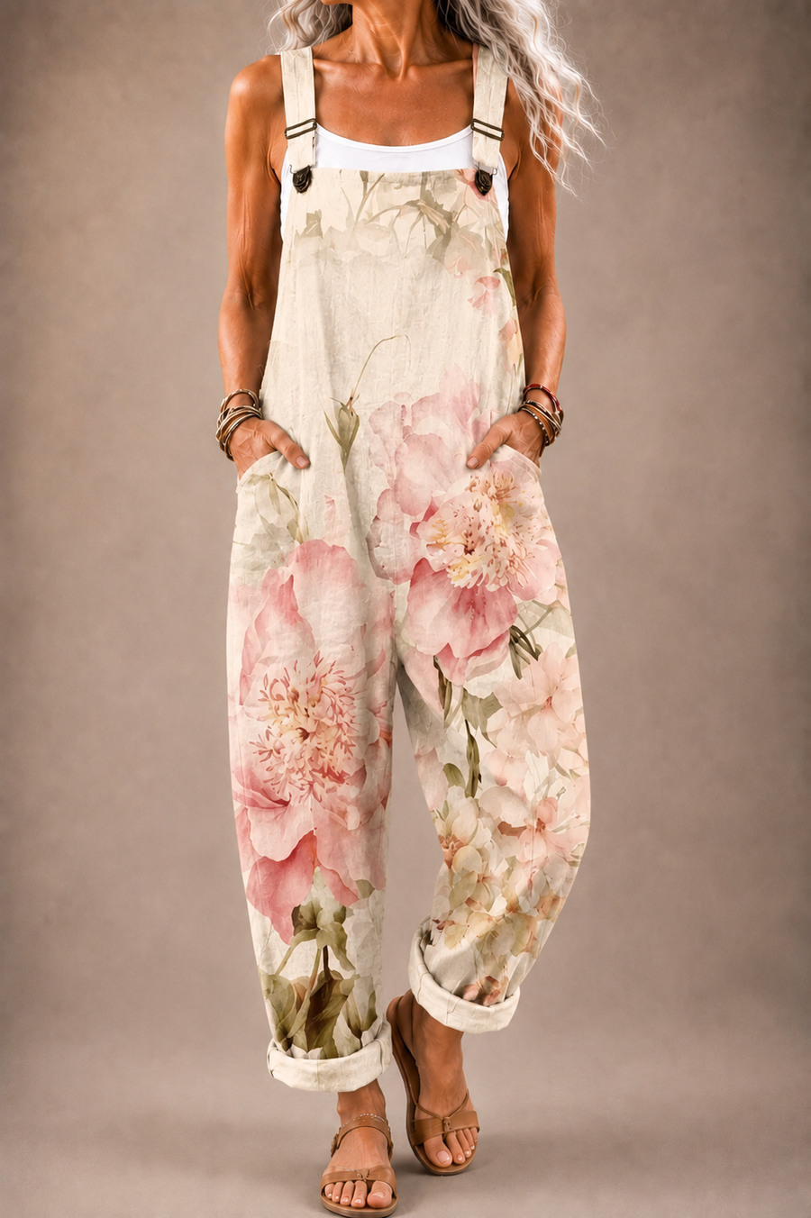 Lara floral overalls with pink flower print, adjustable straps and front bib pocket