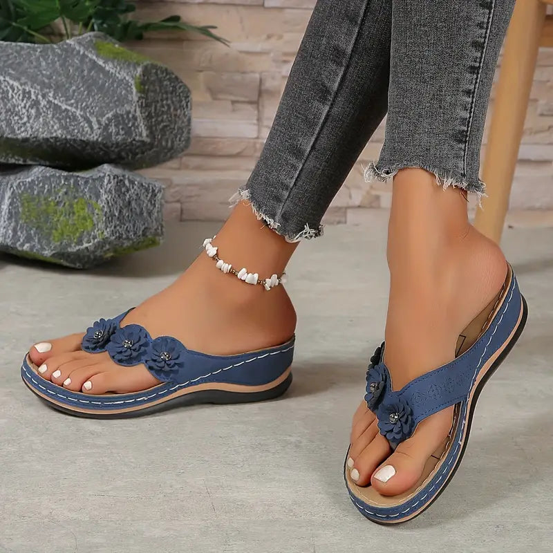 Blue comfort sandals with flower applique and white beaded ankle strap