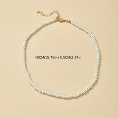 Pearl bead necklace with small gold clasp and delicate chain links