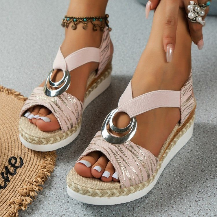 White platform espadrille sandals with silver ring buckle and ankle charm details