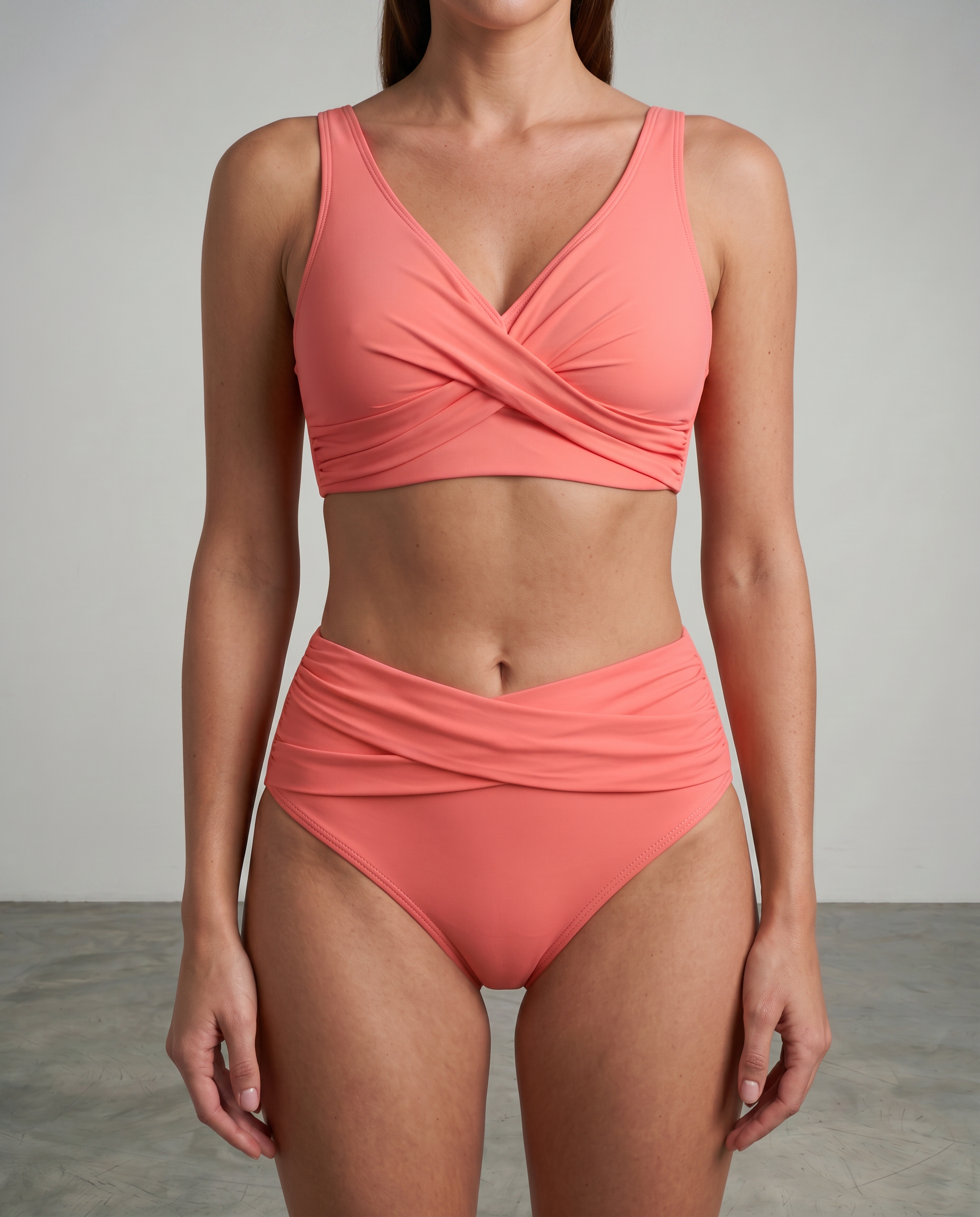 Coral pink shaping bikini set with twist-front bra and ruched high-waist bottoms