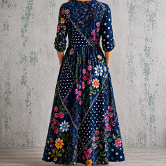 Floral summer dress back view with 3/4 sleeves, gathered waist, dark navy floral print