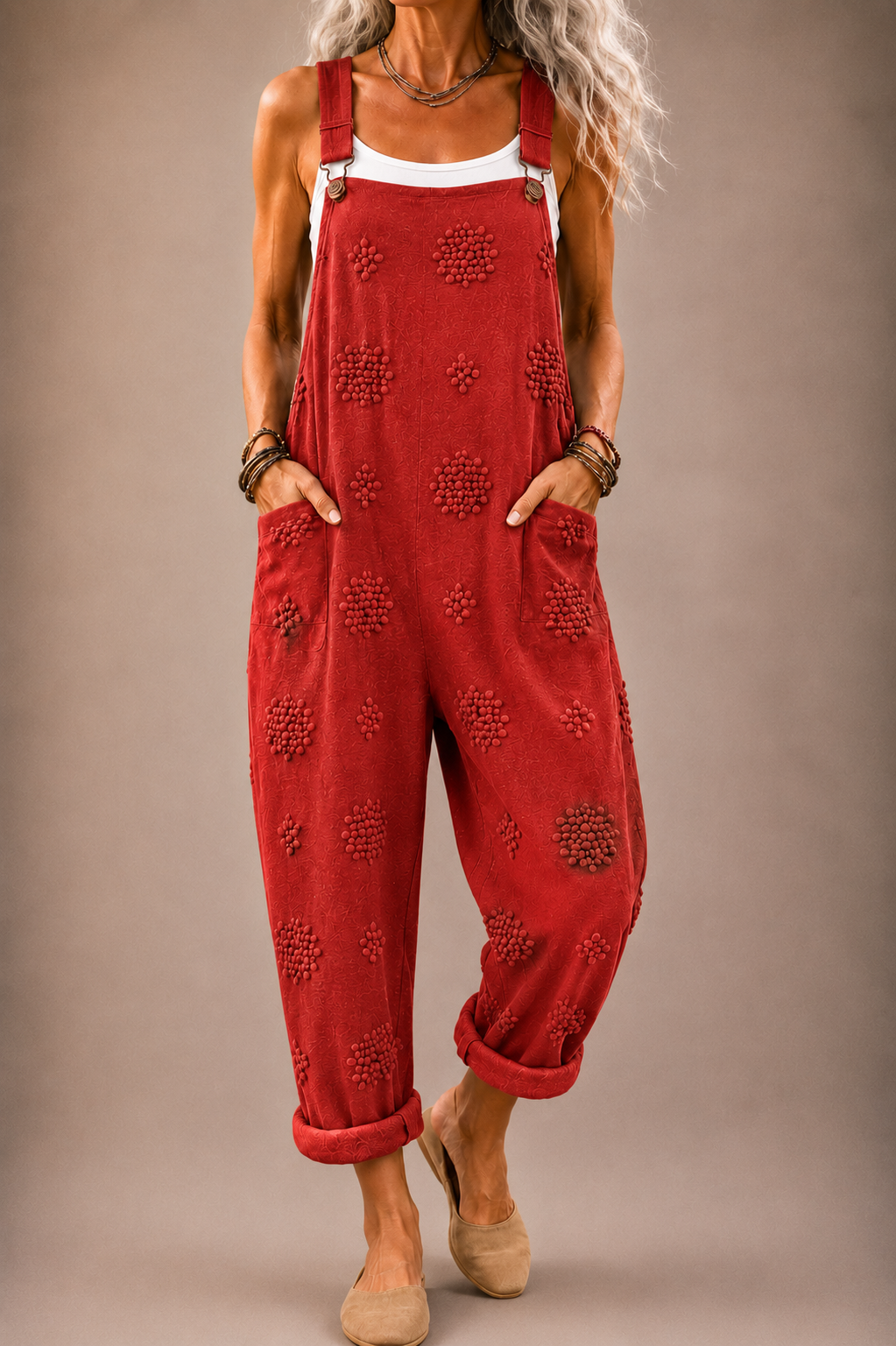 Red embroidered overalls with adjustable straps and front pocket