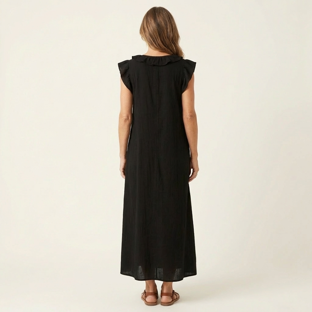 Black maxi dress, back view, ruffled shoulder collar and short flutter sleeves