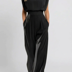 Noemi elegant belted jumpsuit, black sleeveless with tapered wide-leg trousers