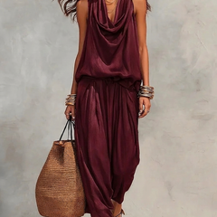 Wine red two-piece set with sleeveless draped cowl-neck top and gathered maxi skirt