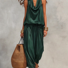 Green two-piece set with sleeveless draped cowl-neck top and gathered maxi skirt