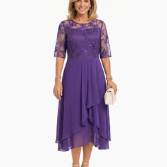 Purple lace midi dress with short sleeves, fitted waist, and tiered ruffle midi hem
