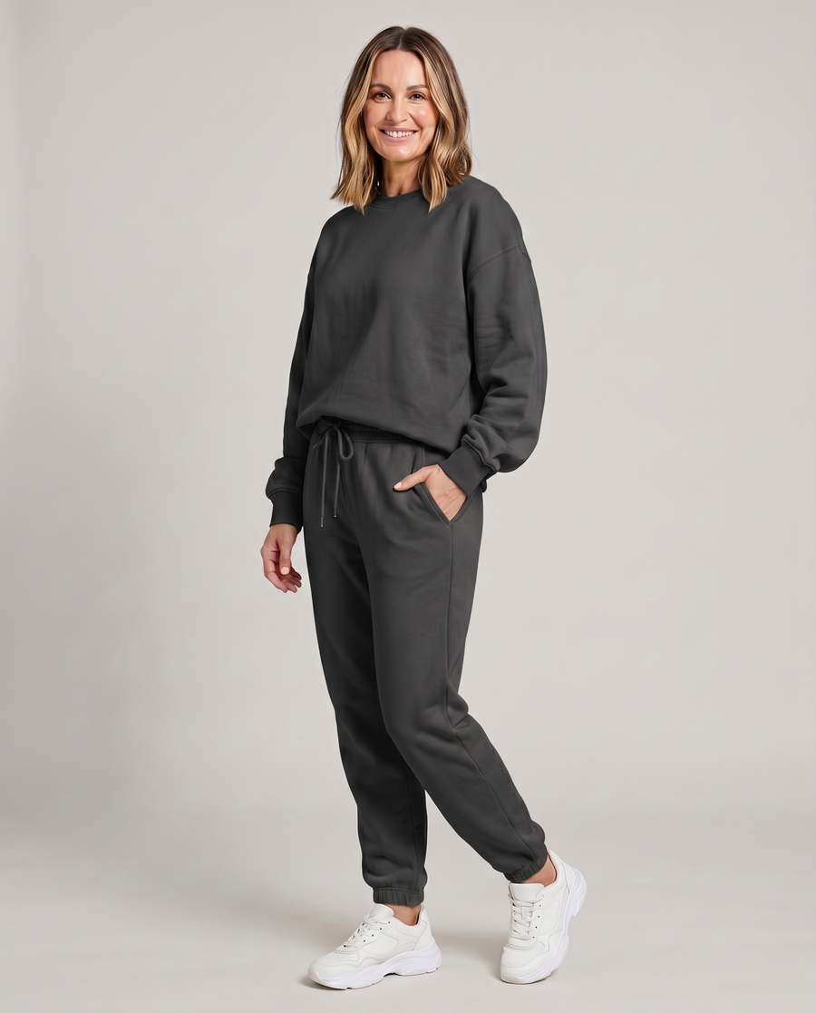 Solid round-neck sweater and drawstring trouser set in dark gray.