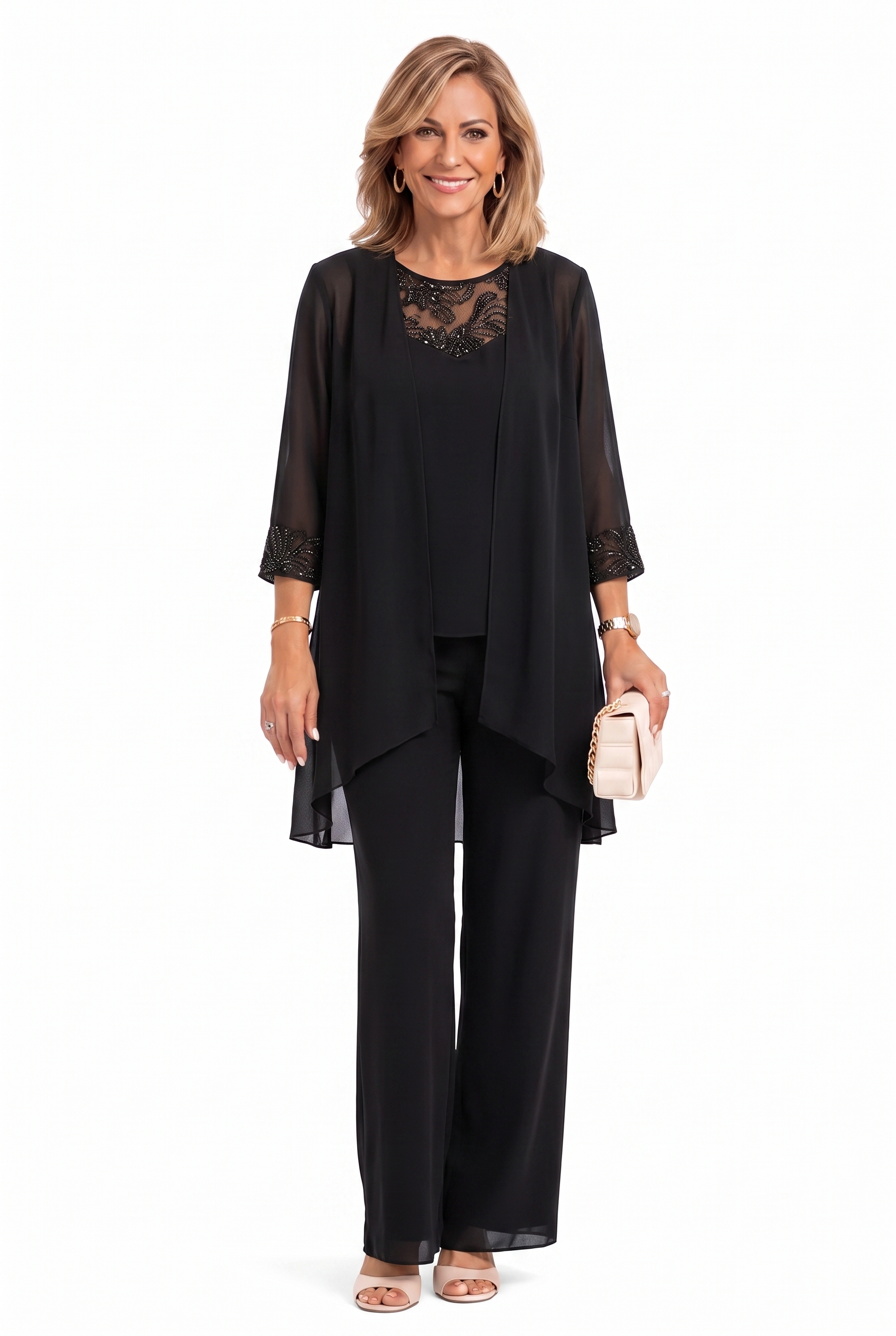 Black three-piece outfit: lace-trim tunic over layered top and matching wide-leg pants