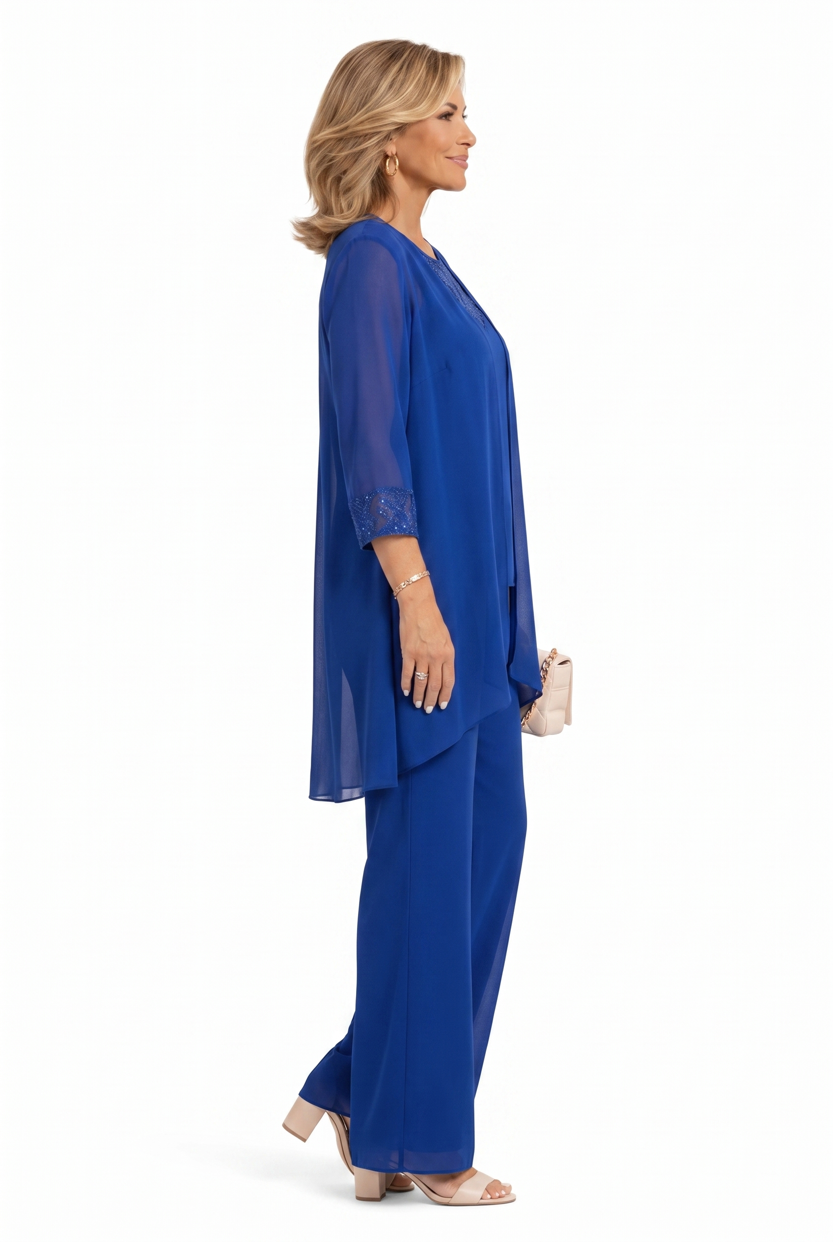 Blue three-piece outfit shown from side: lace-trim tunic, layered top, wide-leg pants
