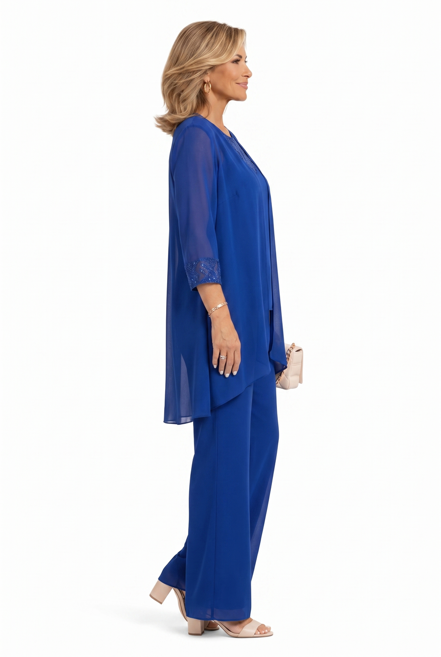 Blue three-piece outfit shown from side: lace-trim tunic, layered top, wide-leg pants