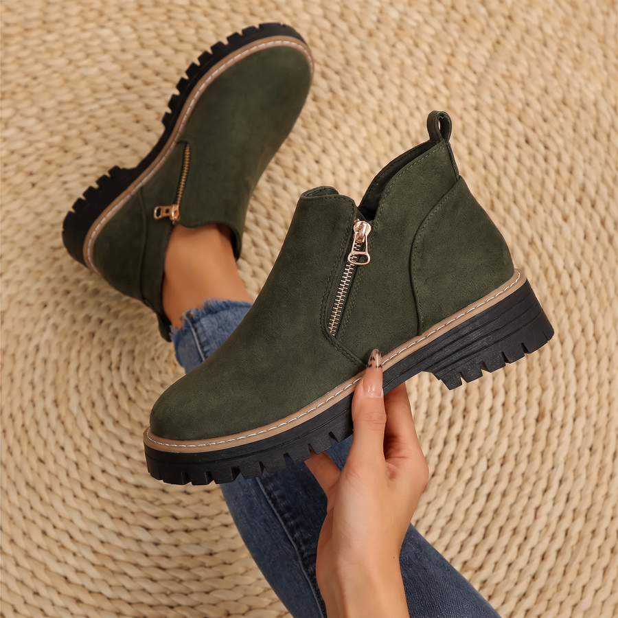 Women’s ankle boots in dark green suede, side zipper and lug rubber sole