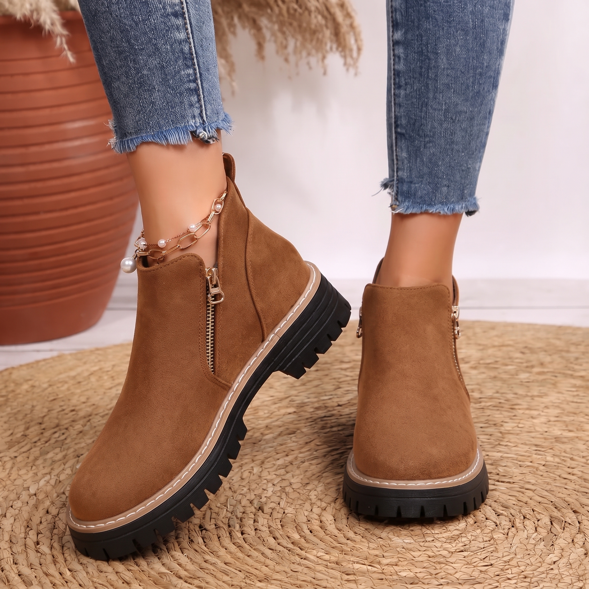 Women's ankle boots, brown suede-look with side zipper and chunky tread sole.
