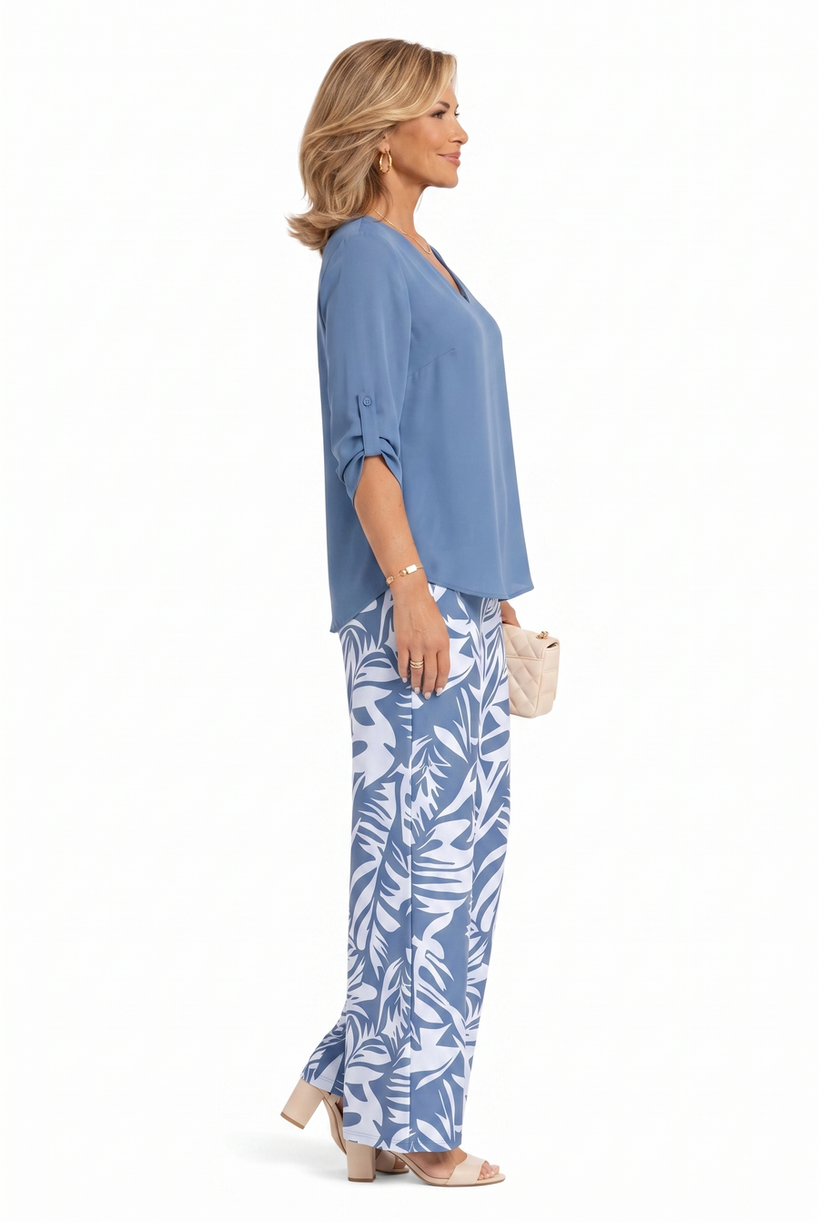 Blue V-neck top and wide-leg pants set with palm-leaf print, side view