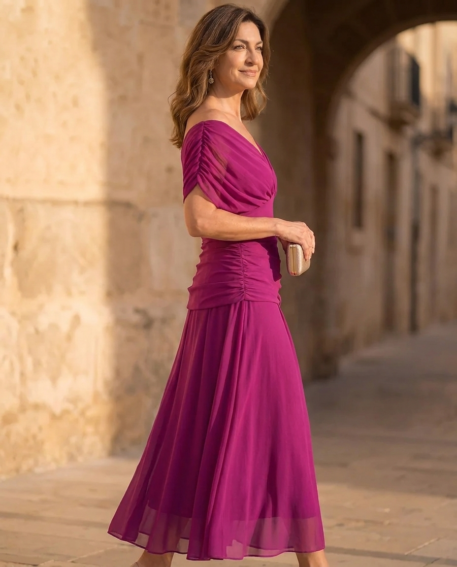 Fuchsia wrap midi dress, off-shoulder drape at sleeves, ruched waist, flared sheer hem