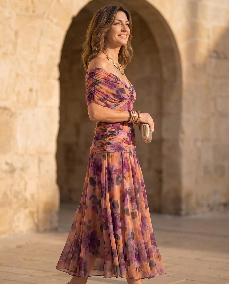 Purple off-shoulder floral dress with short sleeves and pleated maxi skirt