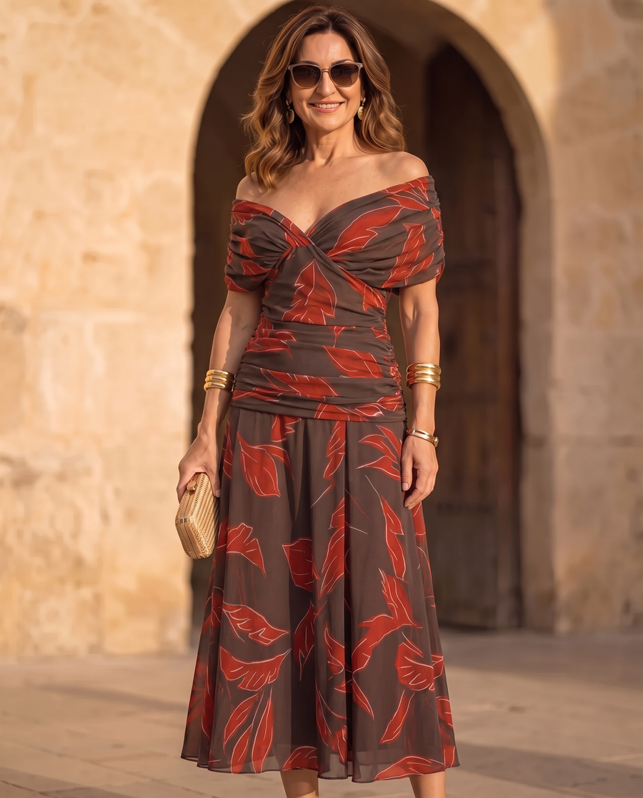 Red off-shoulder leaf-print dress with twisted bodice and gathered midi skirt