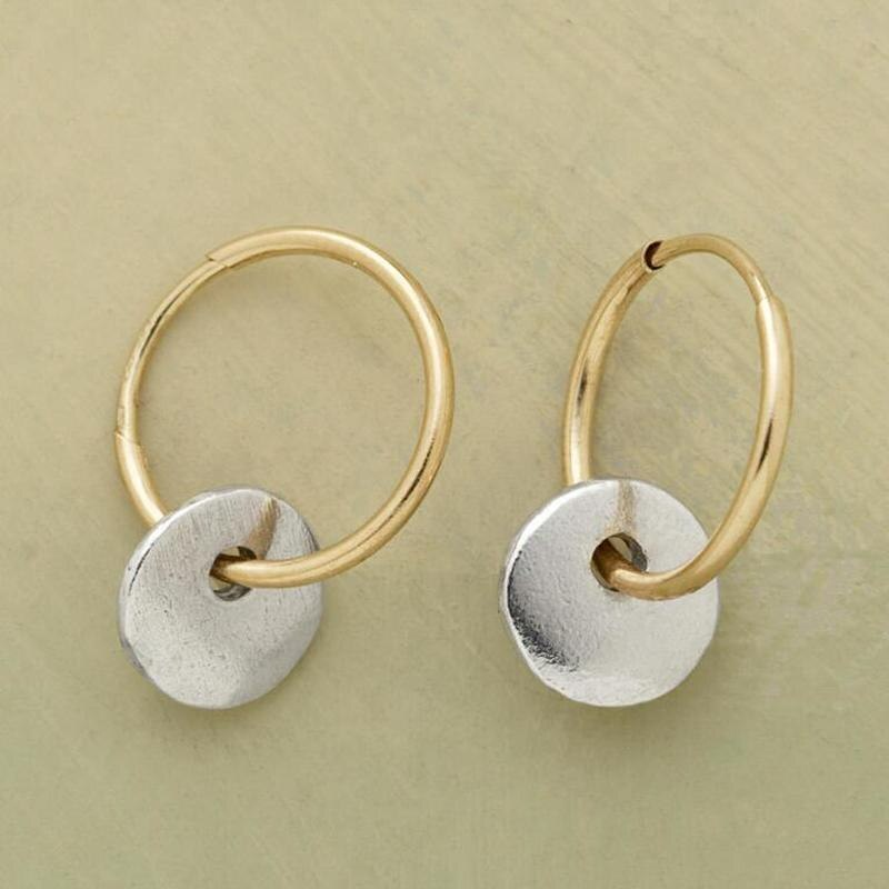 Gold hoop earrings with brushed silver round charm and gold loop connector